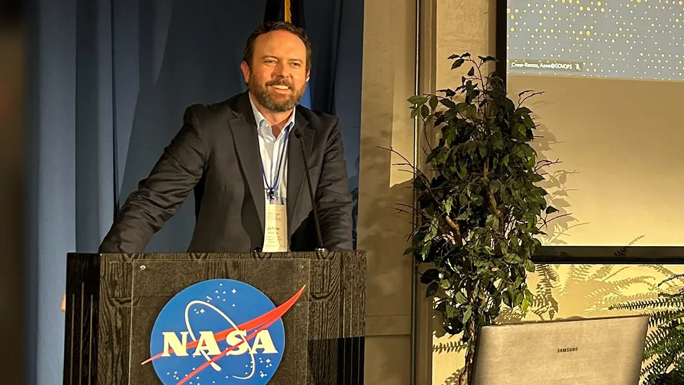 Jeffery Marino, a graduate of CSUSB, speaks at joint NASA/state event in 2023.