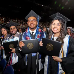 Students celebrate at the 2023 College of Natural Sciences Commencement ceremony at the Toyota Arena. 
