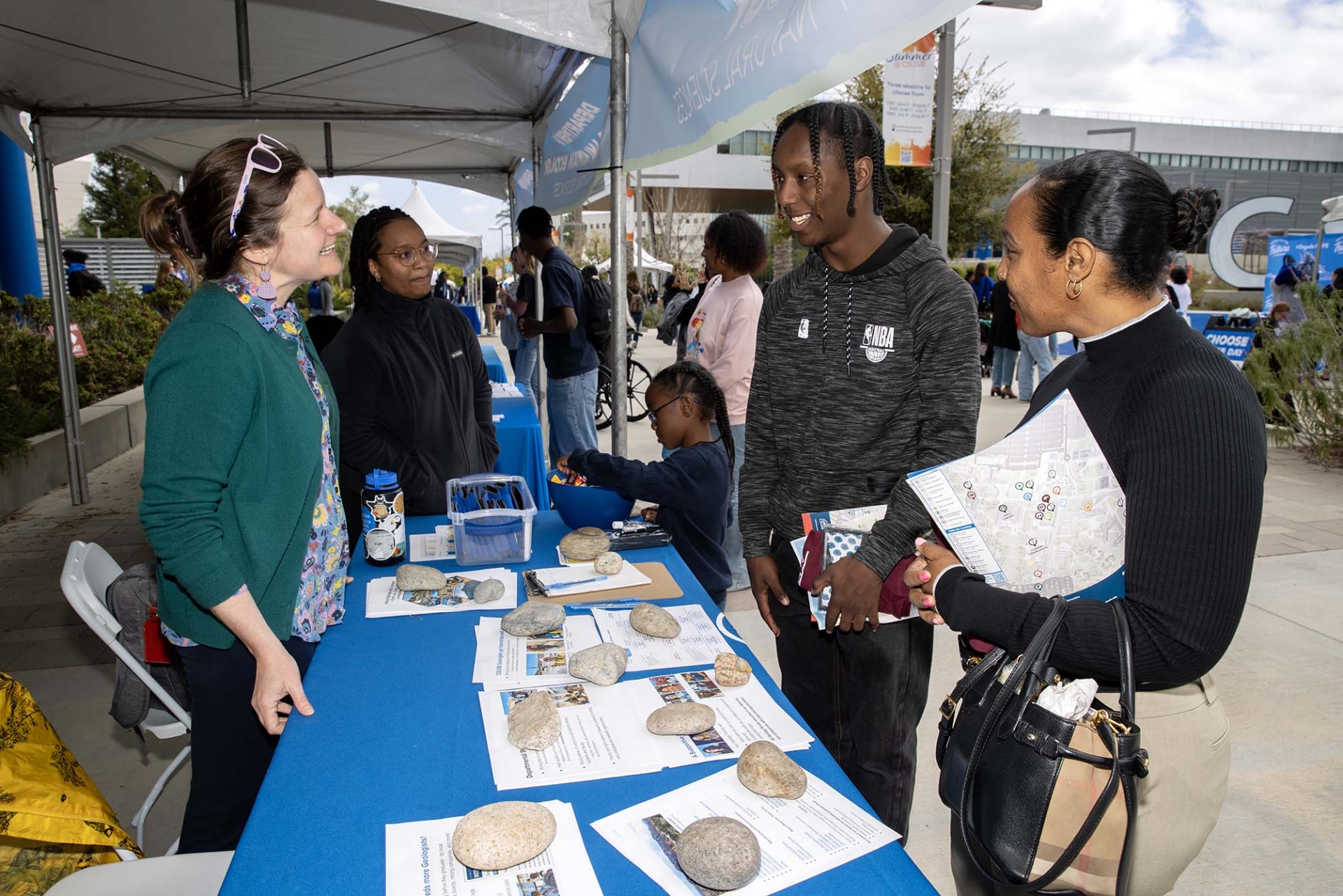 Choose CSUSB Day visitors at one of the booths at the Resource Fair.